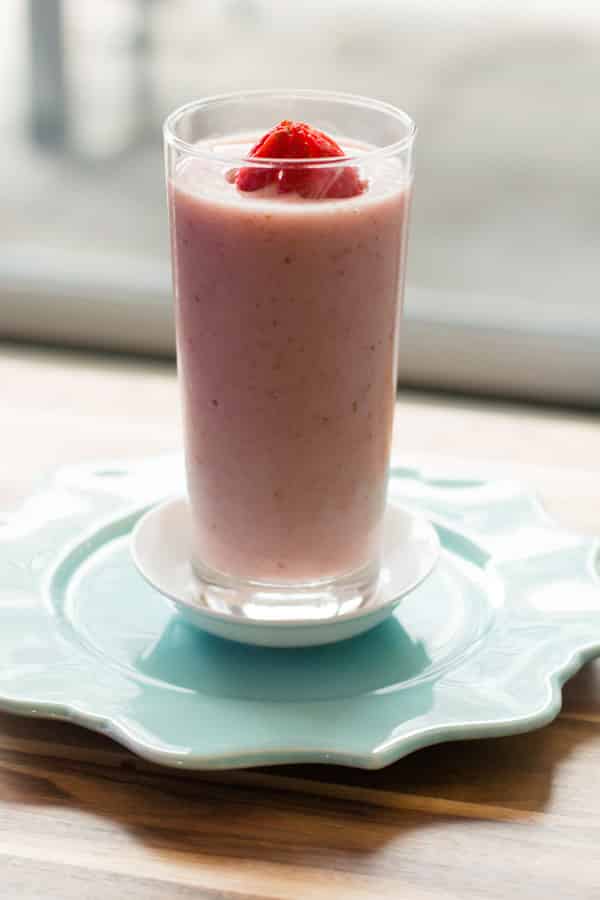 Energy Smoothie - Strawberry and papaya smoothie with a strawberry on top