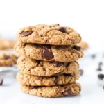 five gluten-free chocolate chip cookies stacked on top of each other