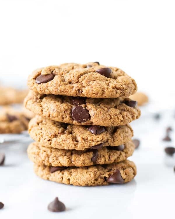 five gluten-free chocolate chip cookies stacked on top of each other