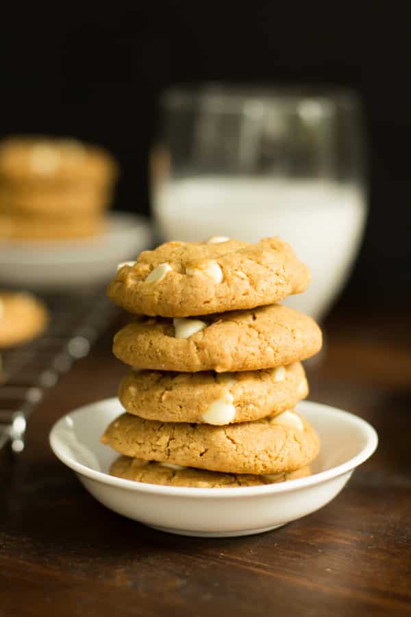 Stack of Peanut Butter Chocolate White Chip Cookies on a plate.