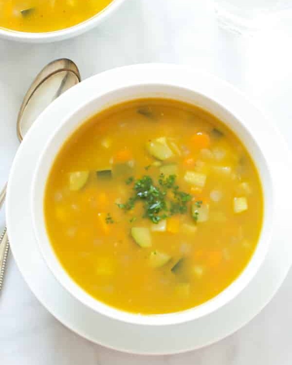 Summer Soup with peas, carrots and zucchini