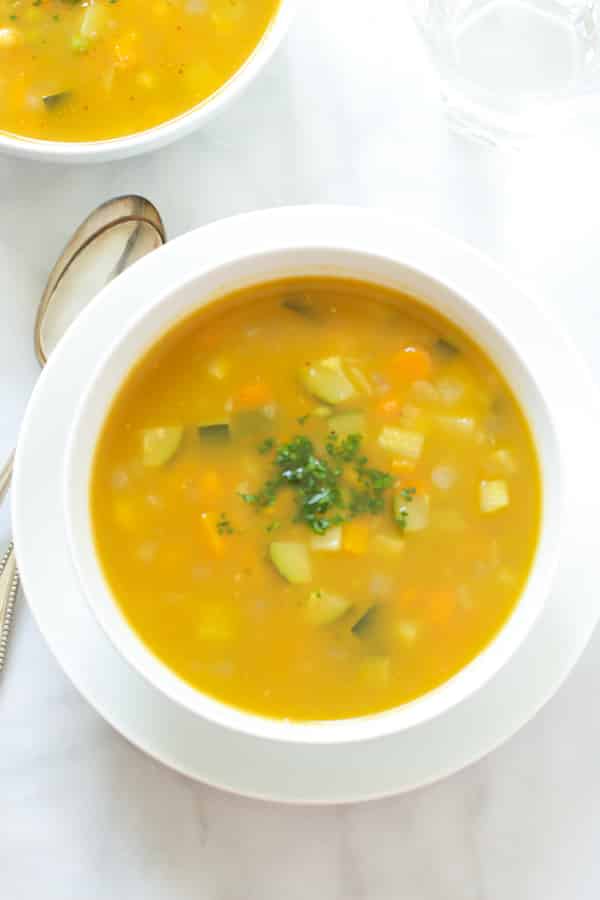 Summer Soup with peas, carrots and zucchini
