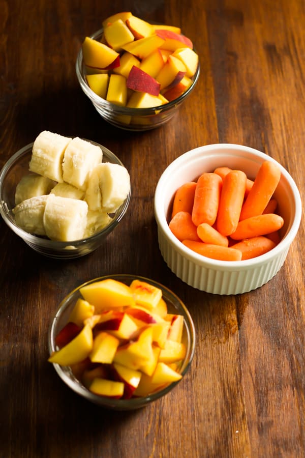 Peach Carrot Smoothie ingredients in prep bowls.