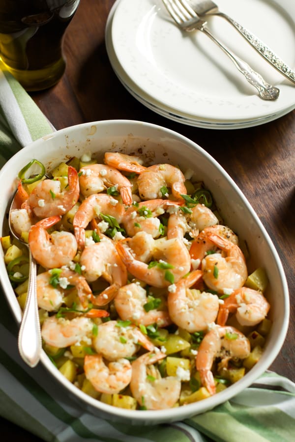 baked Potato with lemon shrimp in a serving dish