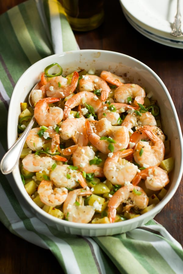 baked Potato with lemon shrimp in a baking dish