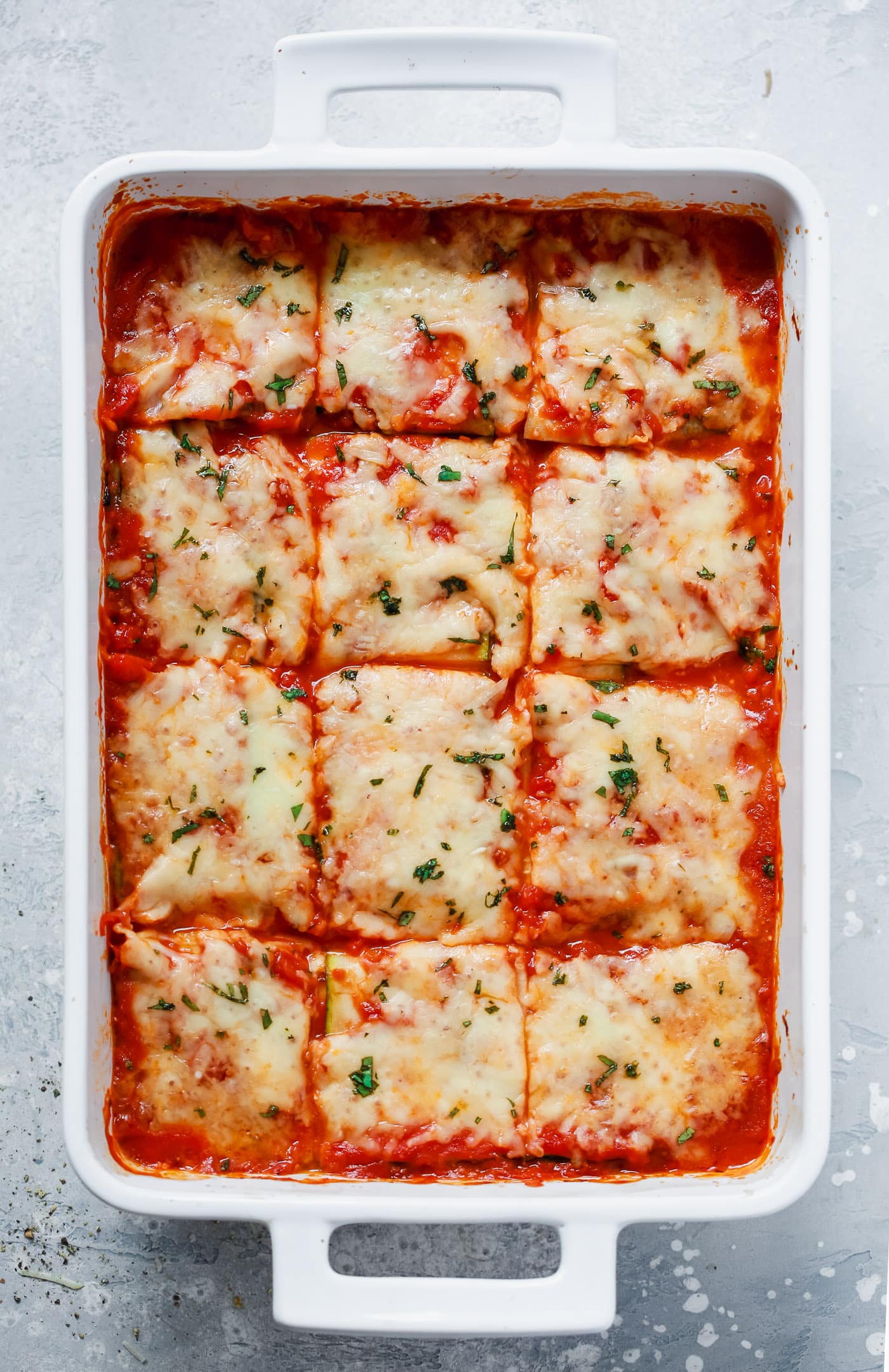 overhead view of Zucchini Lasagna in a white casserole