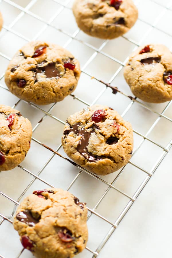 Cashew Butter Cookies with Cranberry and Chocolate Chip Cookies on a cooling rack.