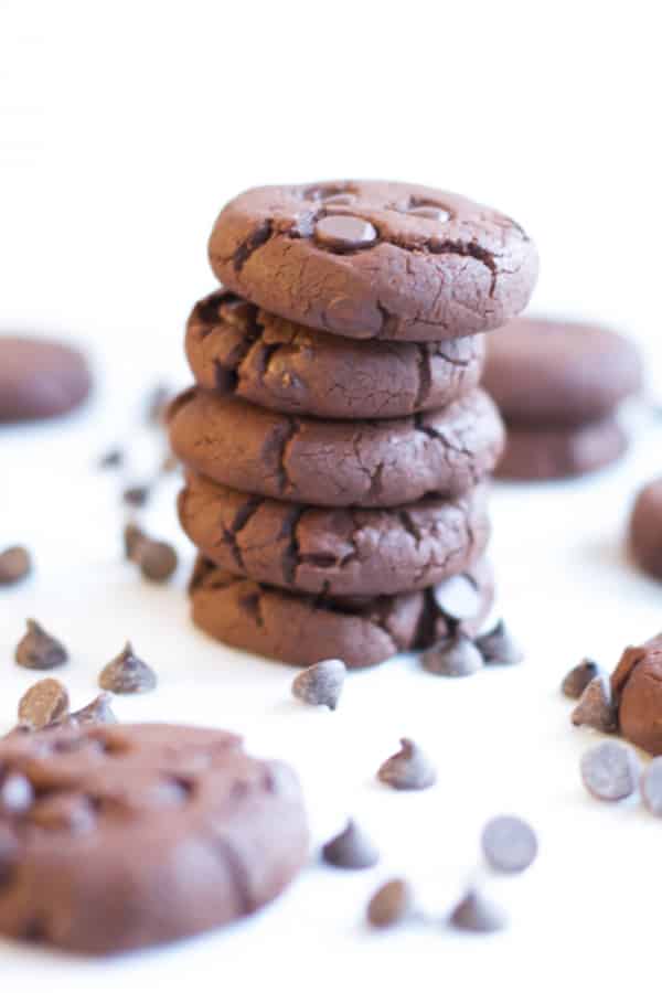 A stack of five gluten free chocolate chunk cookies.