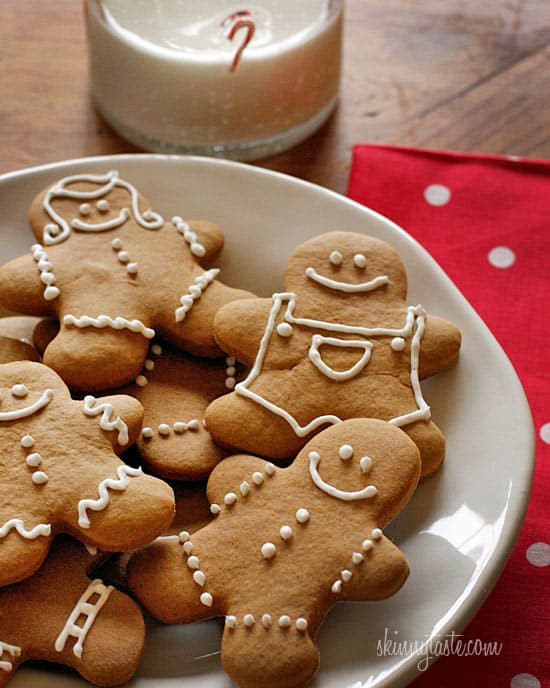 Gingerbread men on a white plate.
