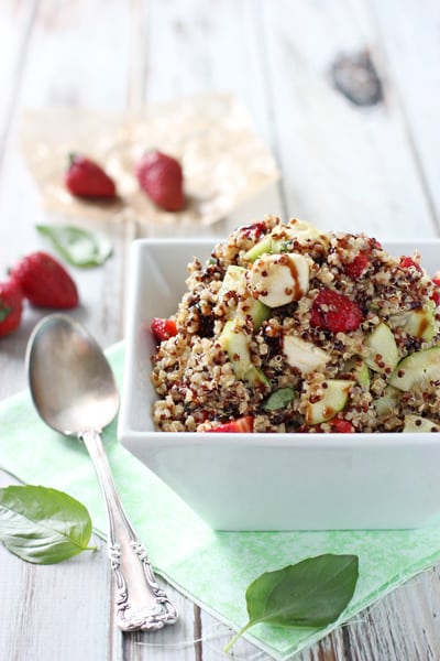 Strawberry-quinoa-balsamic-salad-web-1 Strawberry quinoa balsamic salad in a white bowl.