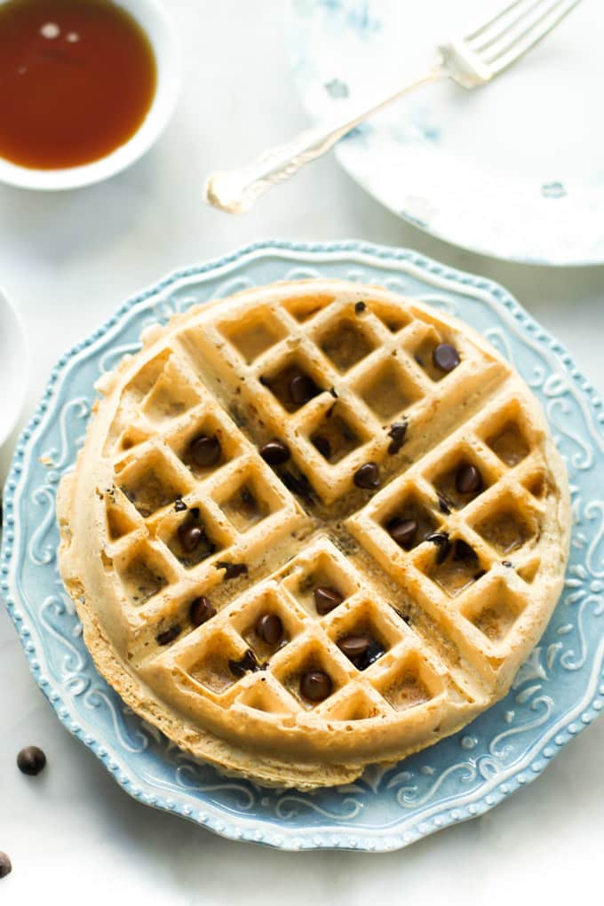 An almond butter waffle on a plate.