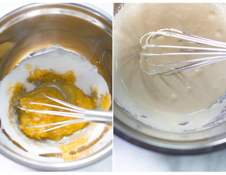A bowl of egg yolks being whisked with sugar and then whisked with vanilla extract.