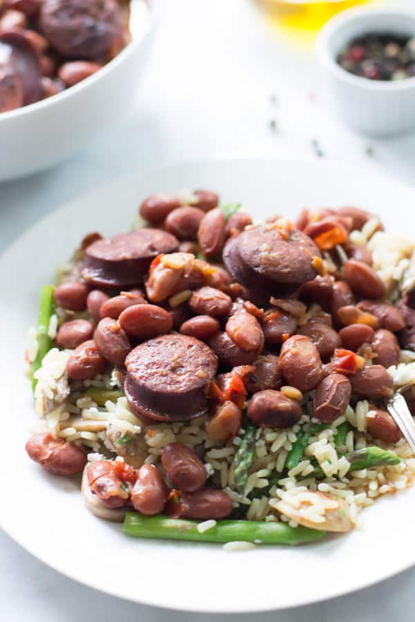 A close up of a plate of pressure cooker sausage and beans.