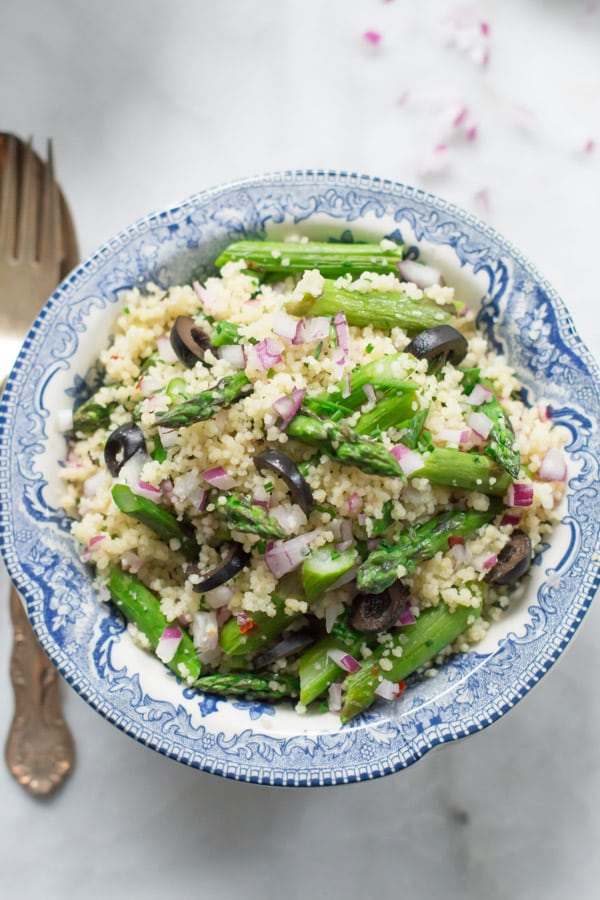 An overhead photo of a bowl of asparagus couscous salad.