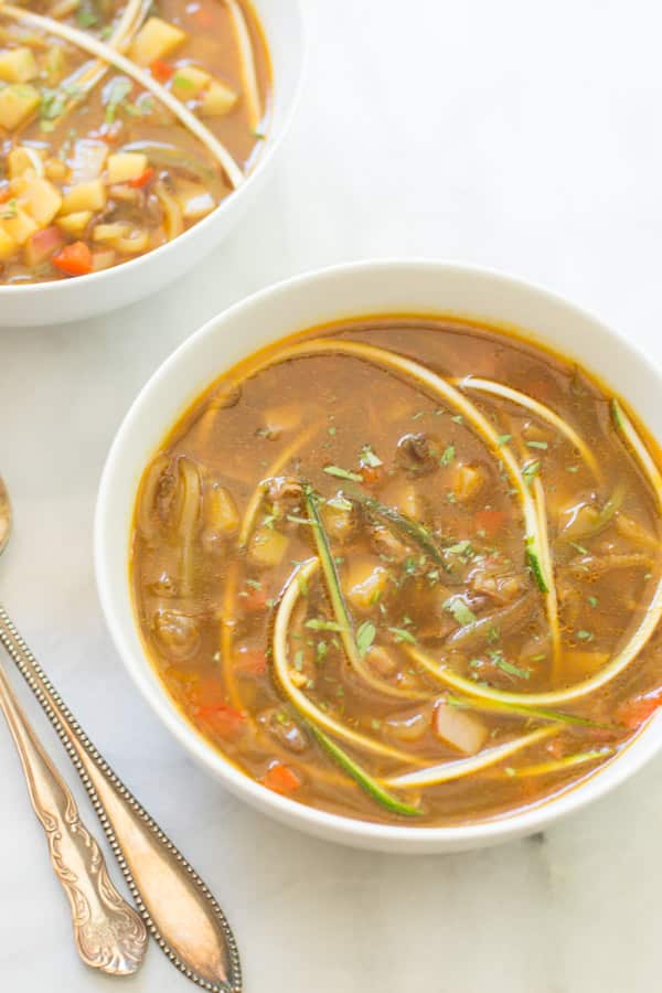 A bowl of zucchini noodle soup.