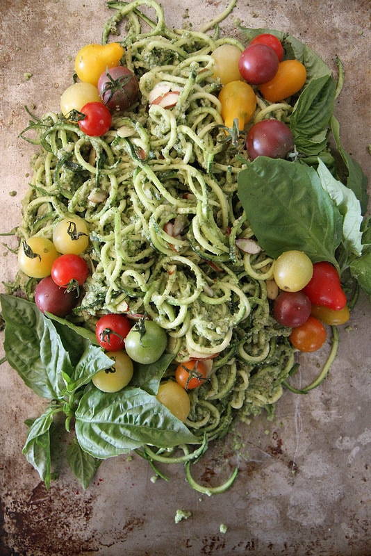 Zucchini Noodles with Basil Almond Pesto and Cherry Tomatoes.
