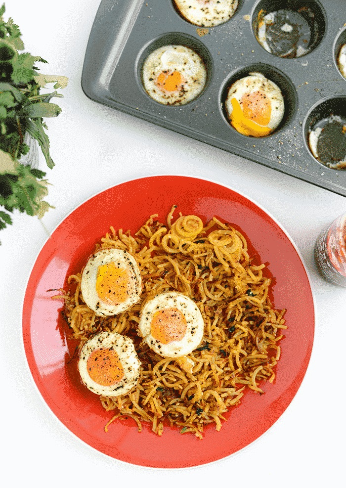 Spiralized Garlic Sriracha Hash Browns with Baked Eggs.