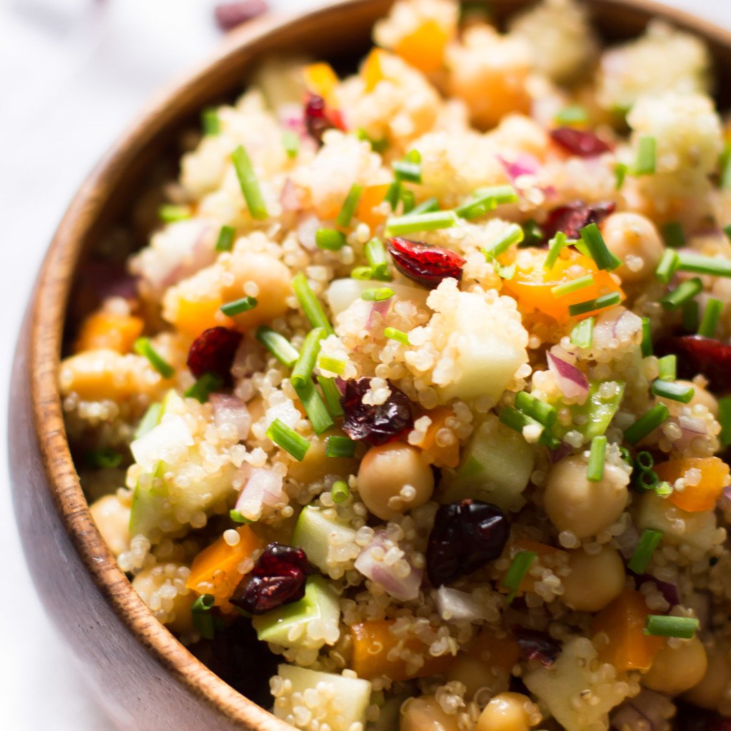 Close up of a bowl of cranberry apple quinoa salad.