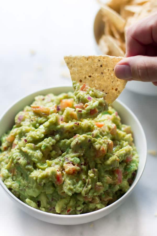 Easiest Guacamole Recipe - This is the easiest guacamole recipe you can find. You will love this simple, quick and incredibly tasty healthy dip. We love it!