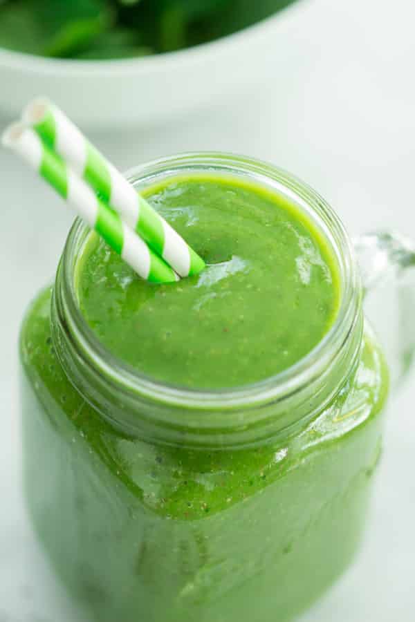 Mango Green Smoothie - This is the fastest way to get more greens in your diet. Make this delicious Mango Green Smoothie and start your day right. 