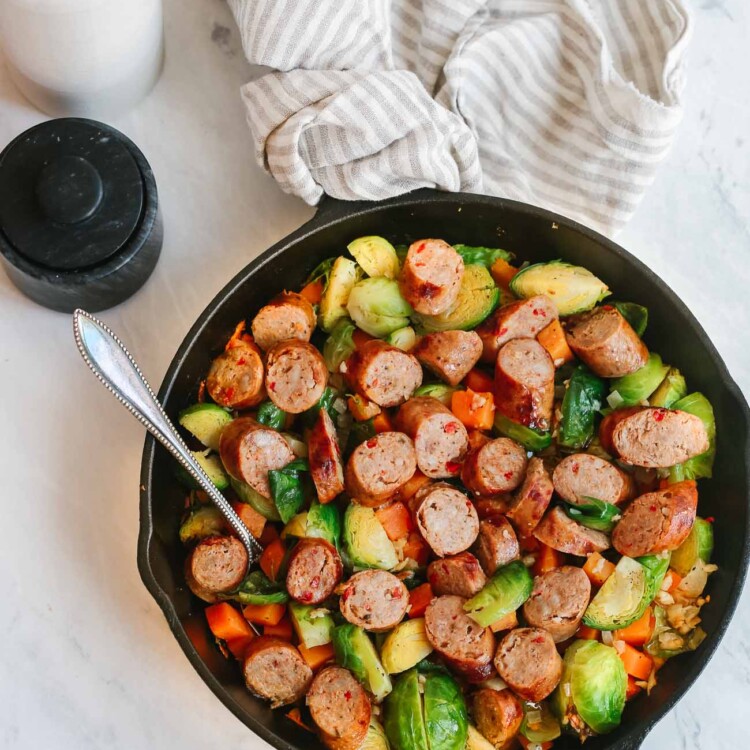 Cast iron with sausage with Brussels sprouts.