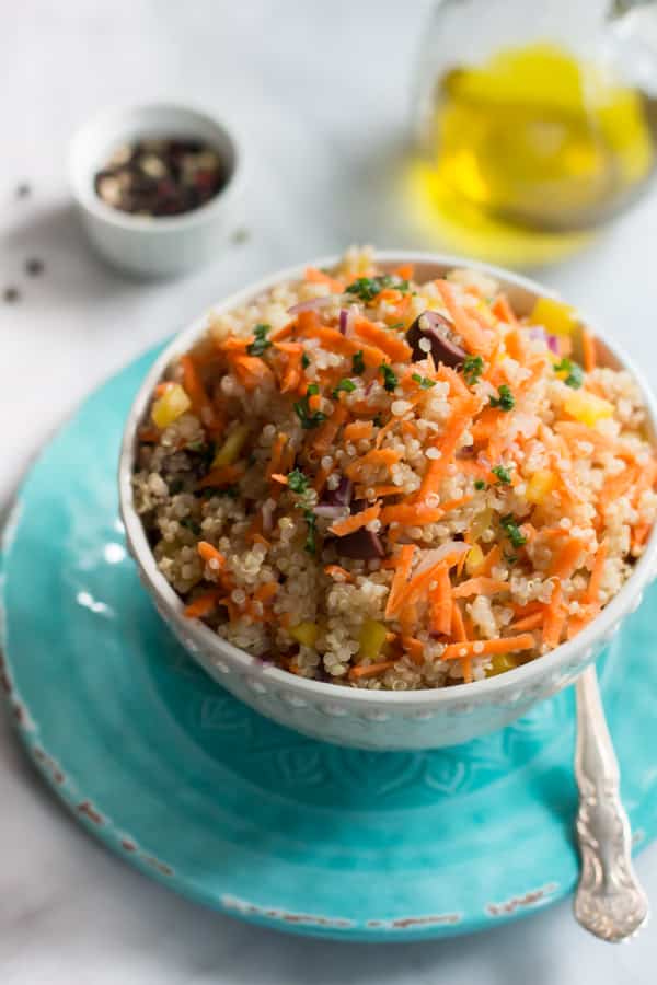 Carrot Quinoa Salad - This quinoa salad is filled with shredded carrots, red onions, bell pepper and olives. It is gluten-free, vegan, healthy and very flavourful too.