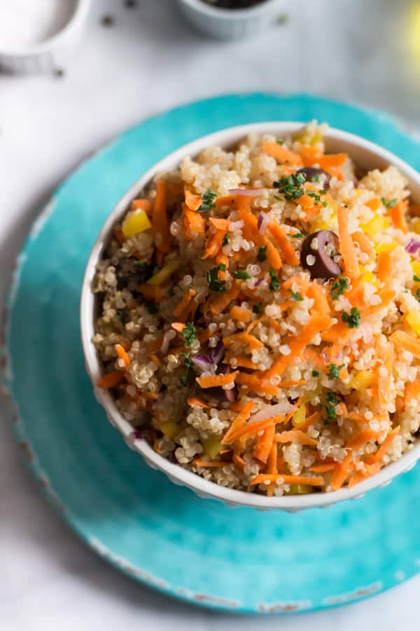 Carrot Quinoa Salad - This quinoa salad is filled with shredded carrots, red onions, bell pepper and olives. It is gluten-free, vegan, healthy and very flavourful too.