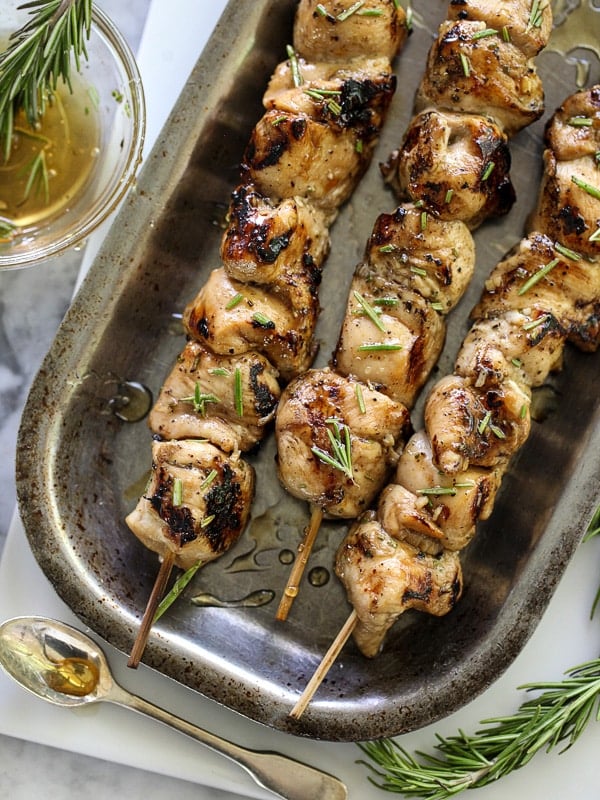 overhead view of Balsamic and Honey Chicken Skewers on a baking sheet