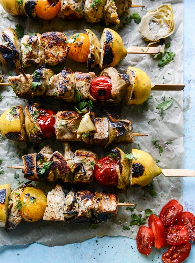 overhead view of artichoke chicken skewers