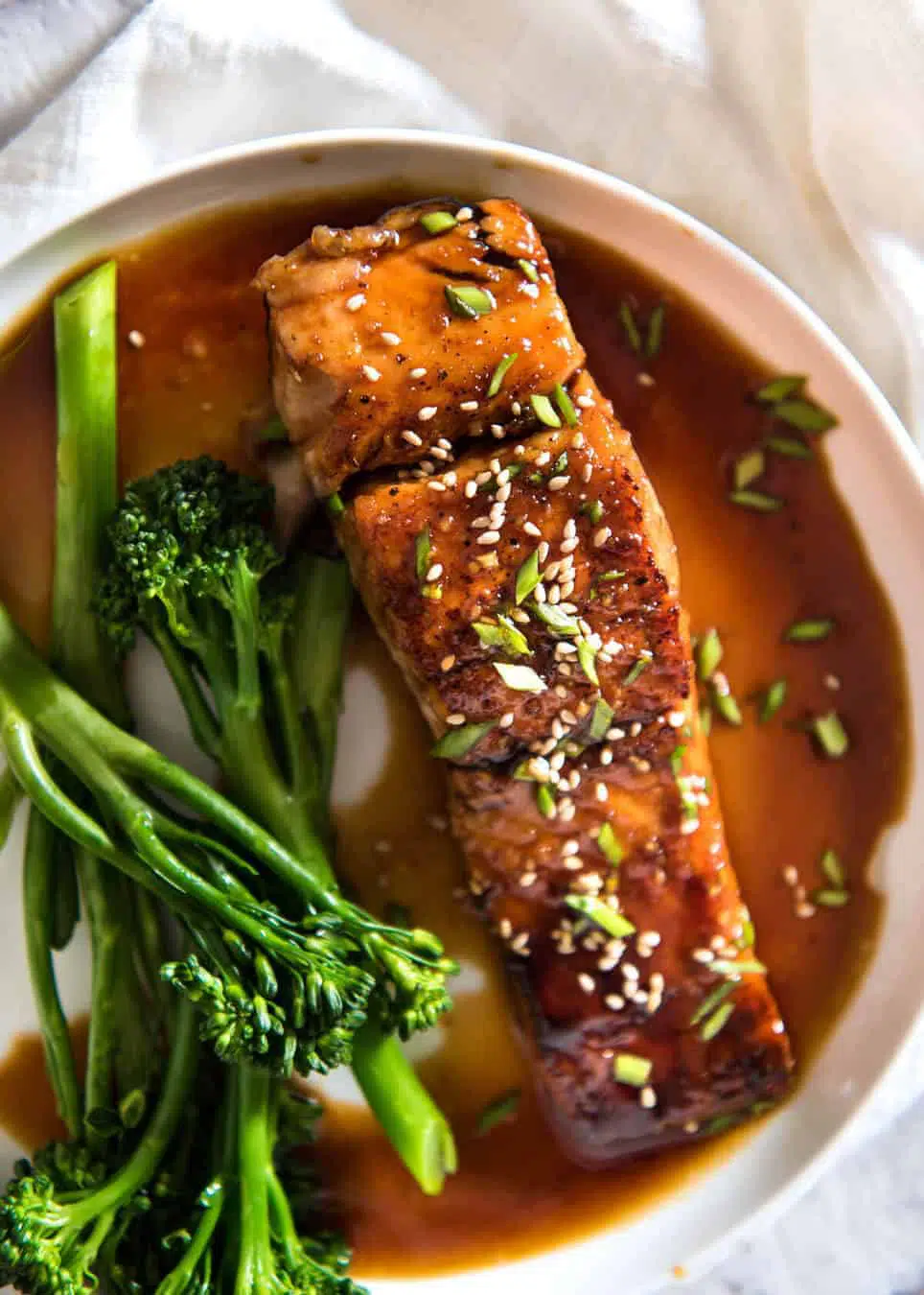 overhead view of salmon in a white bowl