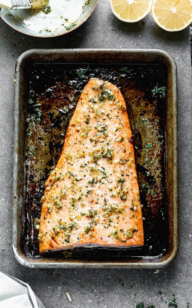 overhead view of salmon fillet in a baking sheet