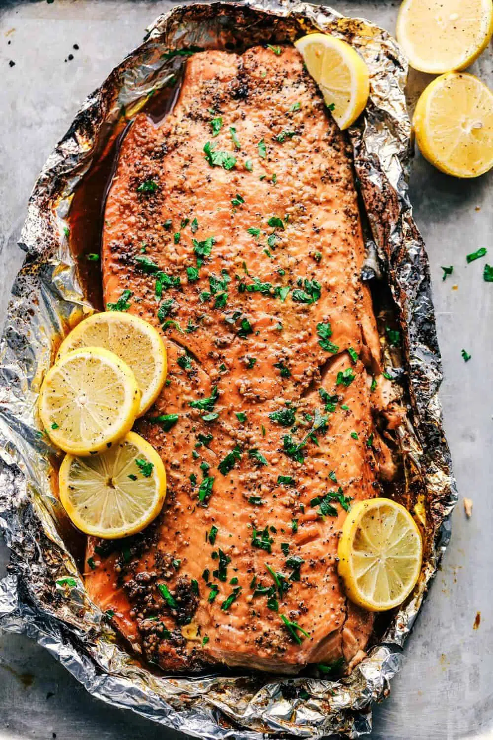 overhead view of salmon fillet in a baking sheet