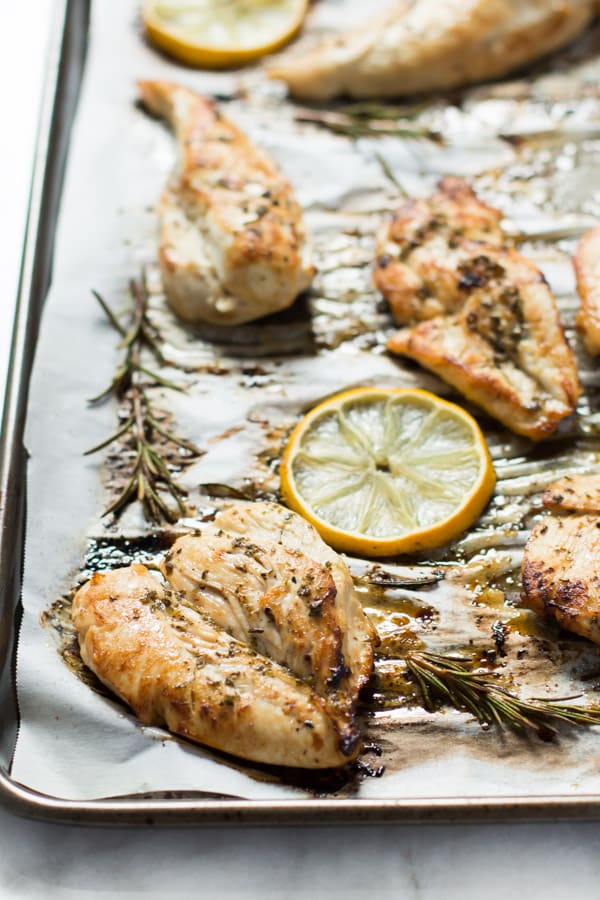 roasted chicken breast on a baking sheet