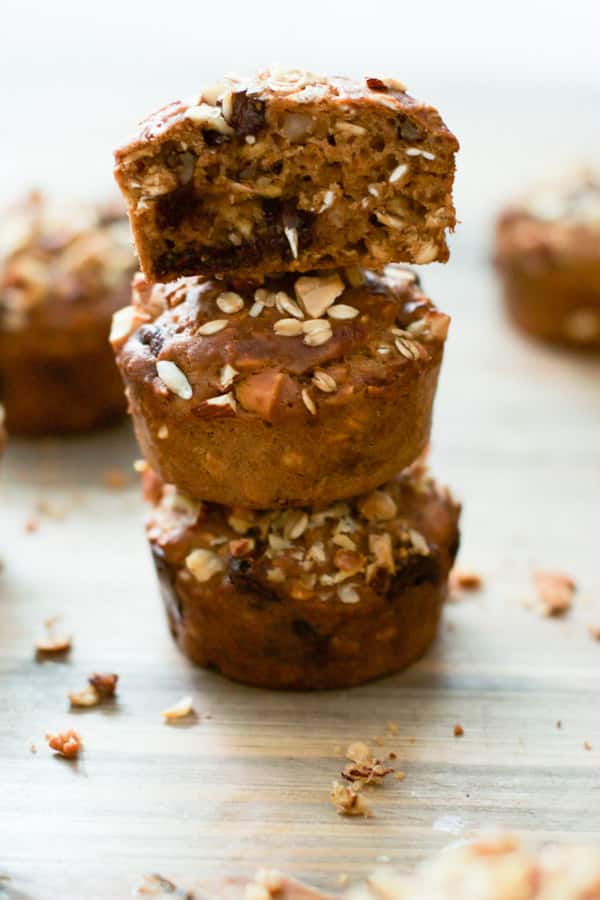 gluten-free-carrot-muffins - These Gluten-free Carrot Muffins are made with rice flour, rolled oats, no butter or oil and loaded with carrots, nuts, Greek yogurt and semi-sweet chocolate chips. They are also delicious with a warm cup of coffee!