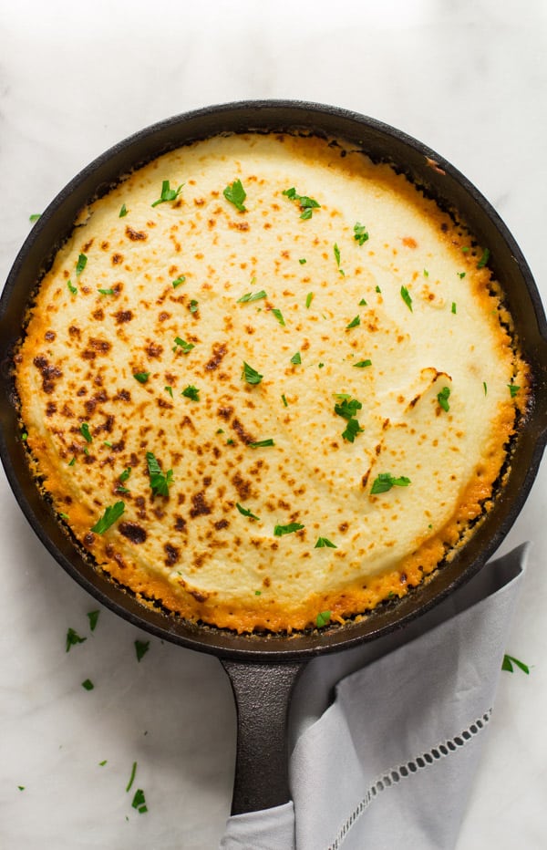 mashed-cauliflower-shepherds-pie- Mashed Cauliflower Shepherd’s Pie - Give a healthy spin in your traditional shepherd's pie recipe by making it with mashed cauliflower. It's very filling, low-carb, gluten-free, paleo-friendly and the most important very DELICIOUS! Mashed Cauliflower Shepherd’s Pie Primavera Kitchen Recipe