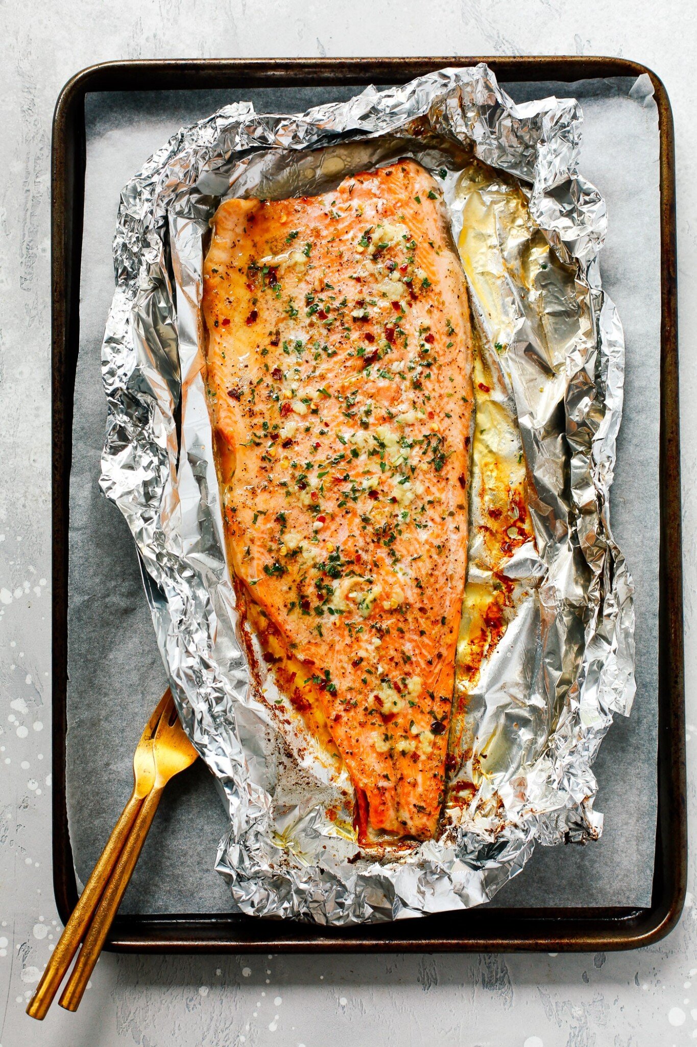 Overhead view of Rainbow Trout Recipe on a baking sheet in foil