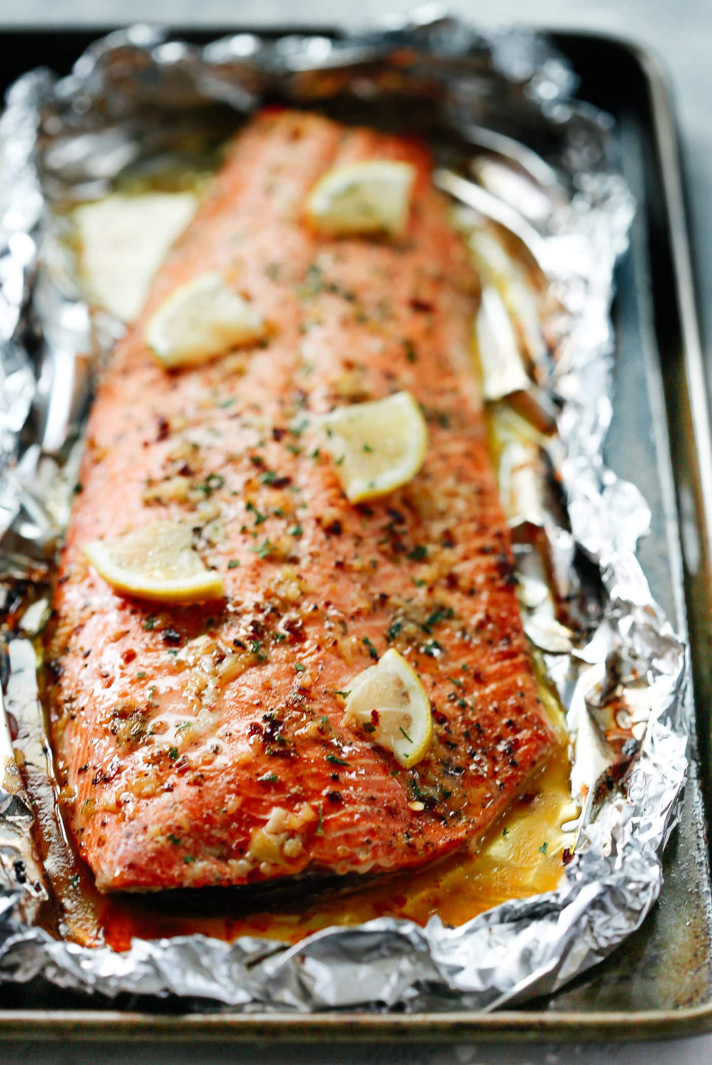 close up of salmon fillet in a baking sheet