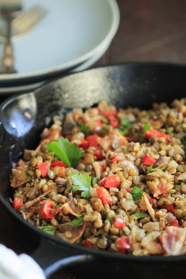 This Warm Bacon Lentil Salad is very easy and quick to make and it is tossed with a delicious Dijon dressing! www.primaverakitchen.com