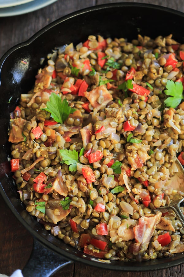 This Warm Bacon Lentil Salad is very easy and quick to make and it is tossed with a delicious Dijon dressing! www.primaverakitchen.com