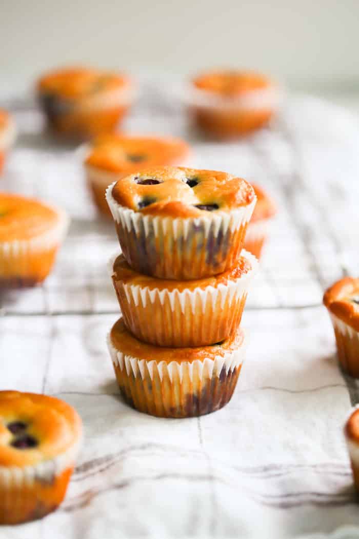Low-carb Lemon Blueberry Blender Muffins - These Low-carb Lemon Blueberry Blender Muffins are easy, healthy, gluten-free and just 136 calories each! close-up of Low-carb Lemon Blueberry Blender Muffins in a muffin pan