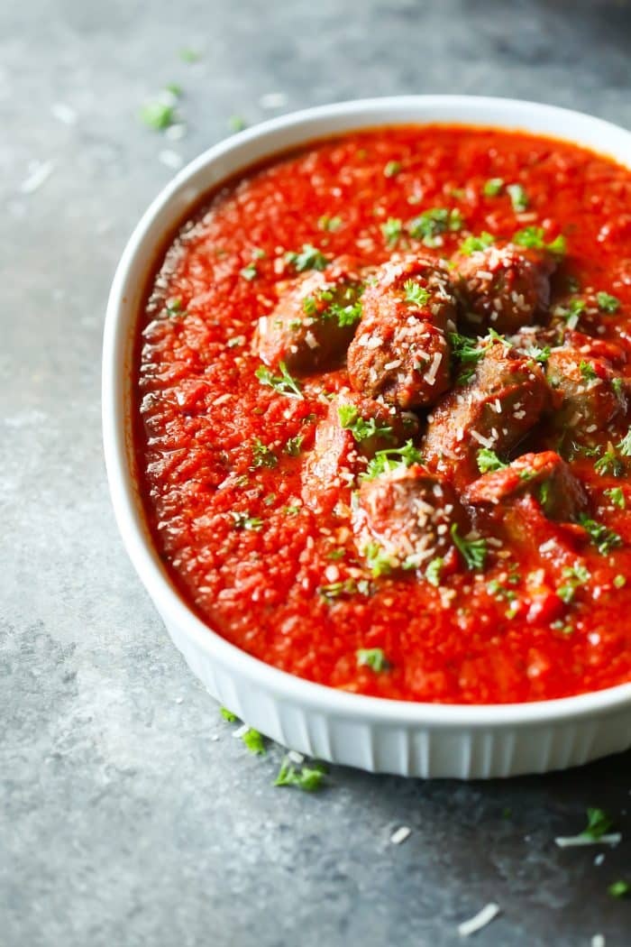 This Italian Sausage Tomato Sauce is loaded with tomatoes and spices. It's great over zucchini noodles, pasta, mashed potatoes and even on its own. 