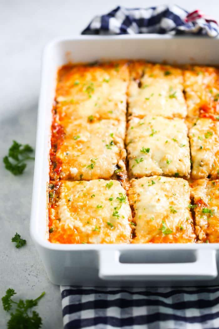 Low-carb eggplant lasagna in a large, white baking dish. 