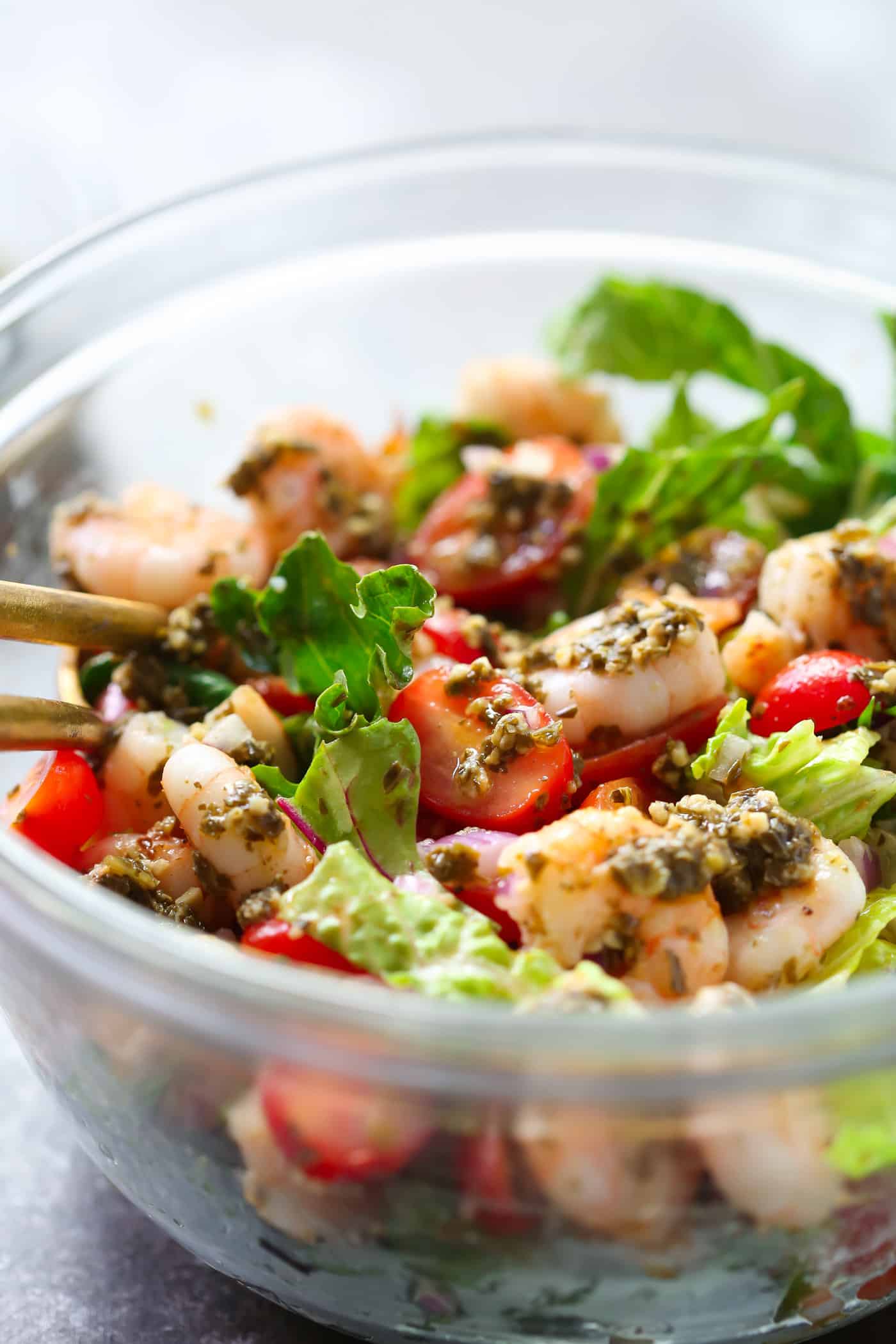 This Pesto Shrimp Tomato Salad Recipe is ready in 10 minutes and it's a perfect quick lunch or light dinner meal for the week. Enjoy! 