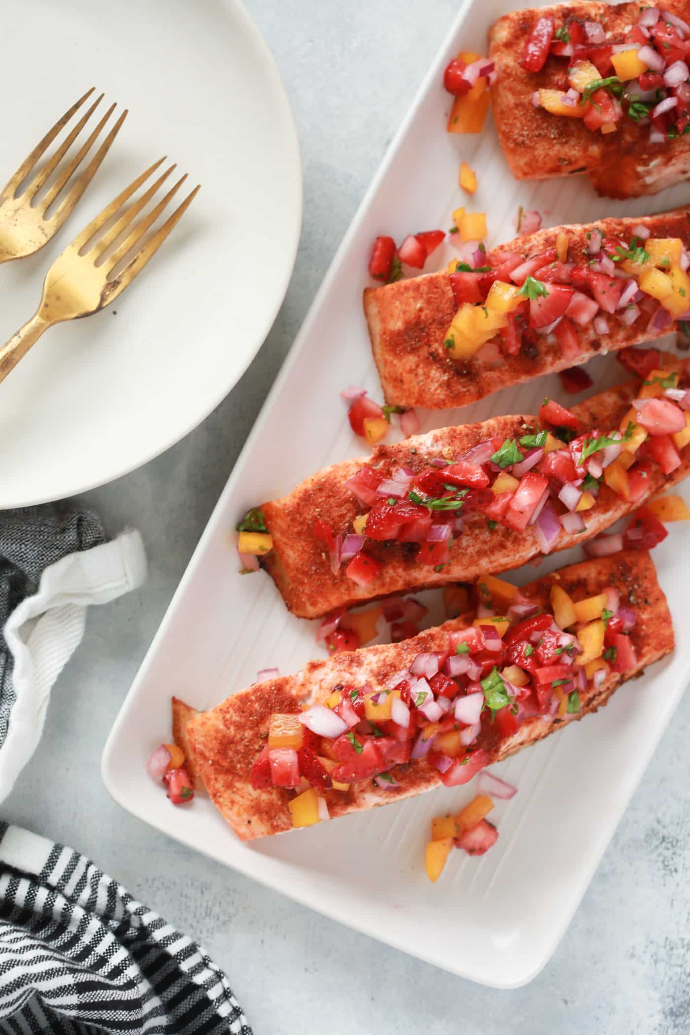 This Cajun Salmon with Strawberry Salsa is a perfect summer lunch or light dinner to enjoy during the week. It's easy to make, gluten-free, low-carb and paleo-friendly. 