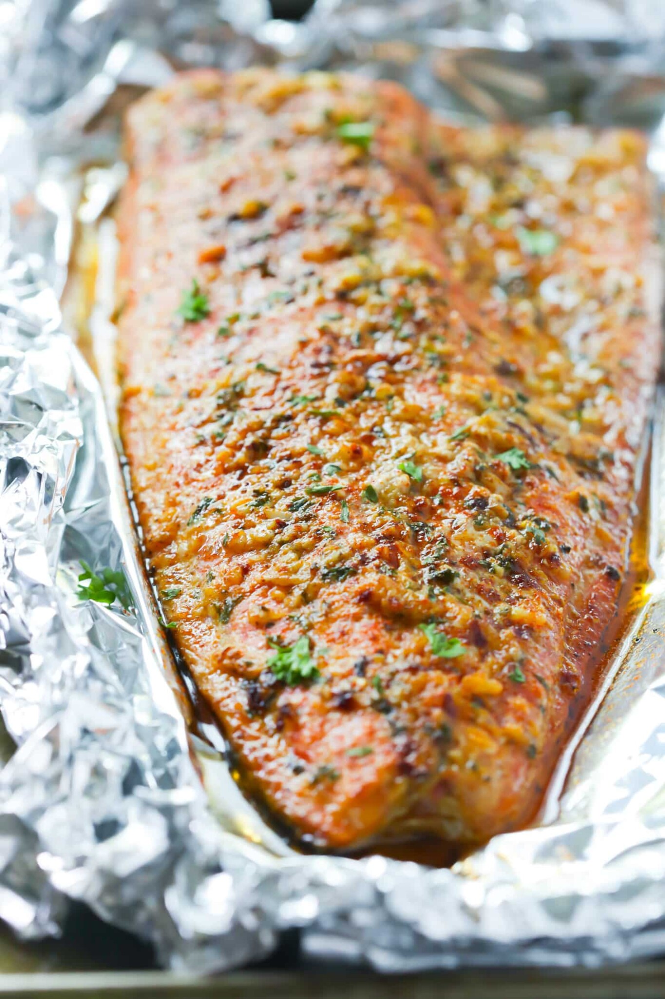 closeup of a spicy salmon fillet in a baking sheet