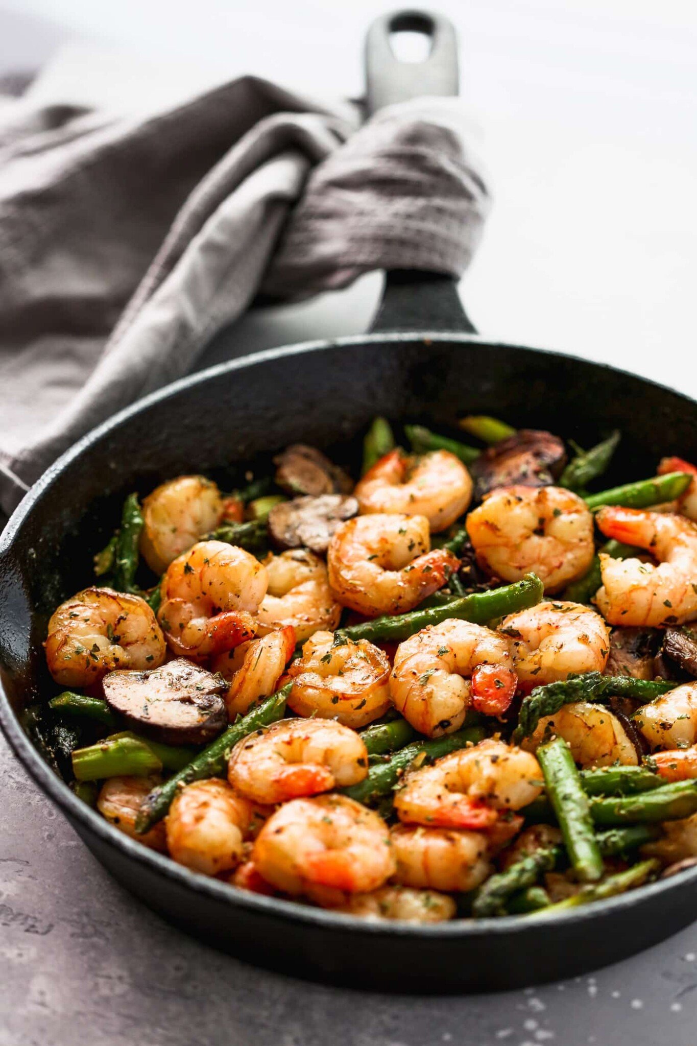 Closed up of a healthy skillet recipe called shrimp and asparagus skillet