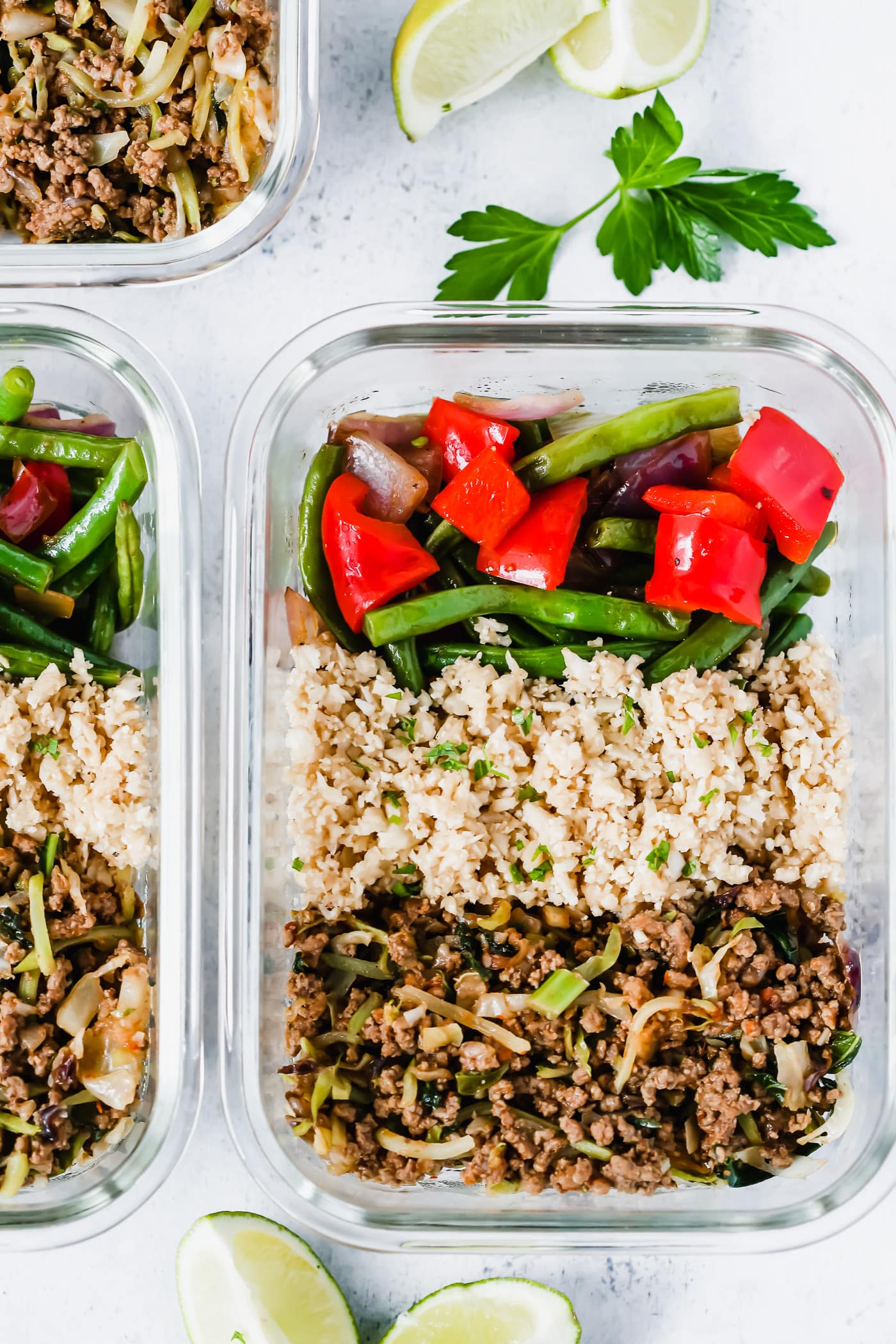 Ground turkey, cauliflower rice and veggie meal prep bowls.