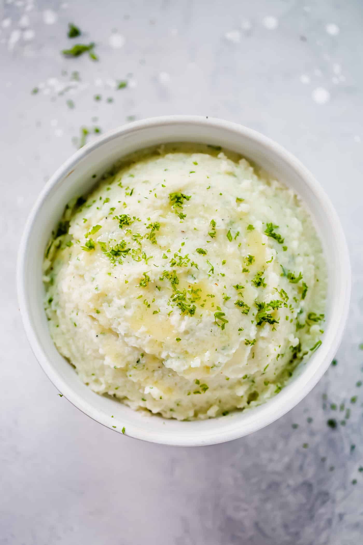 Overhead photo of a bowl of mashed cauliflower. 