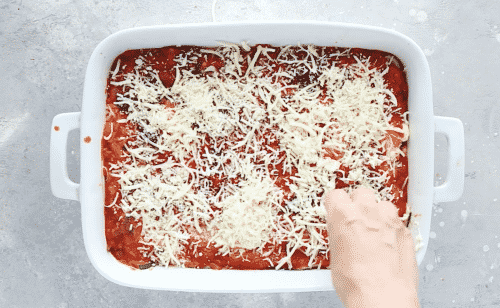 overhead view of zucchini lasagna in a white casserole