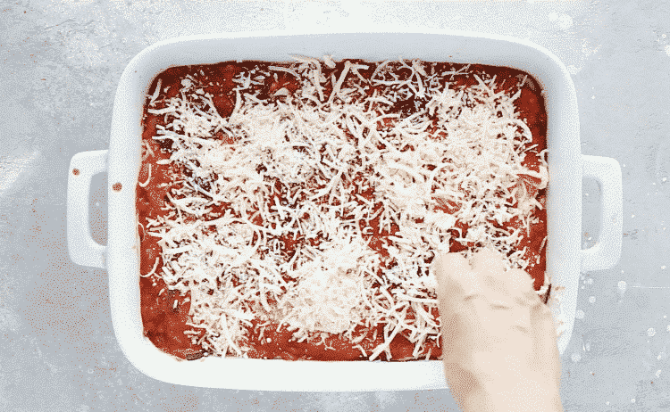 overhead view of zucchini lasagna in a white casserole
